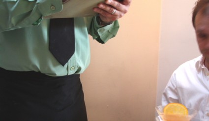 waiter takes order